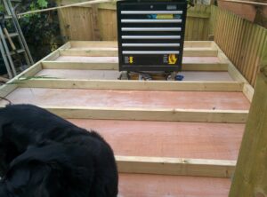 Close up of the shed base completed and one wall being made
