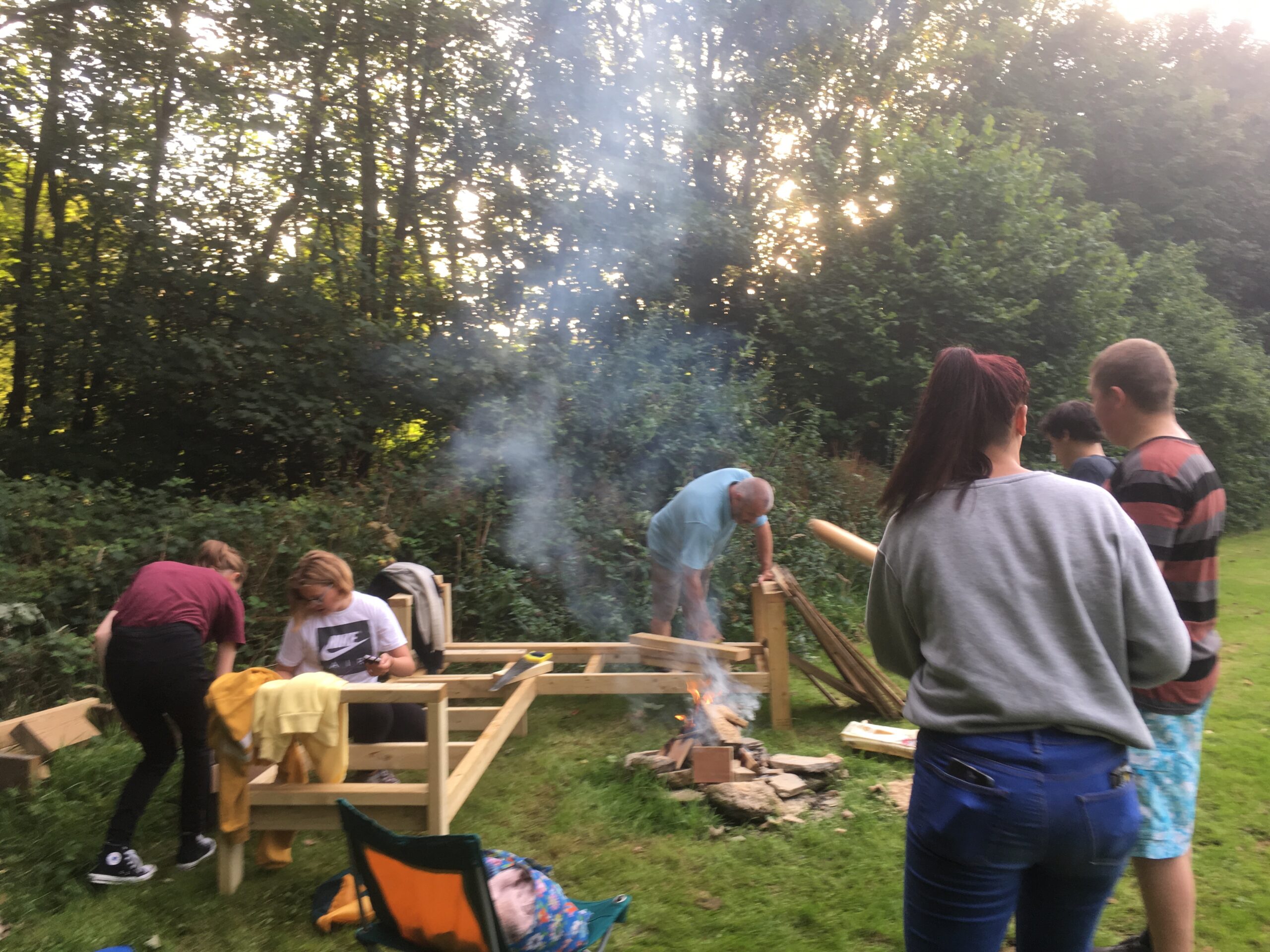 Young People building a bench