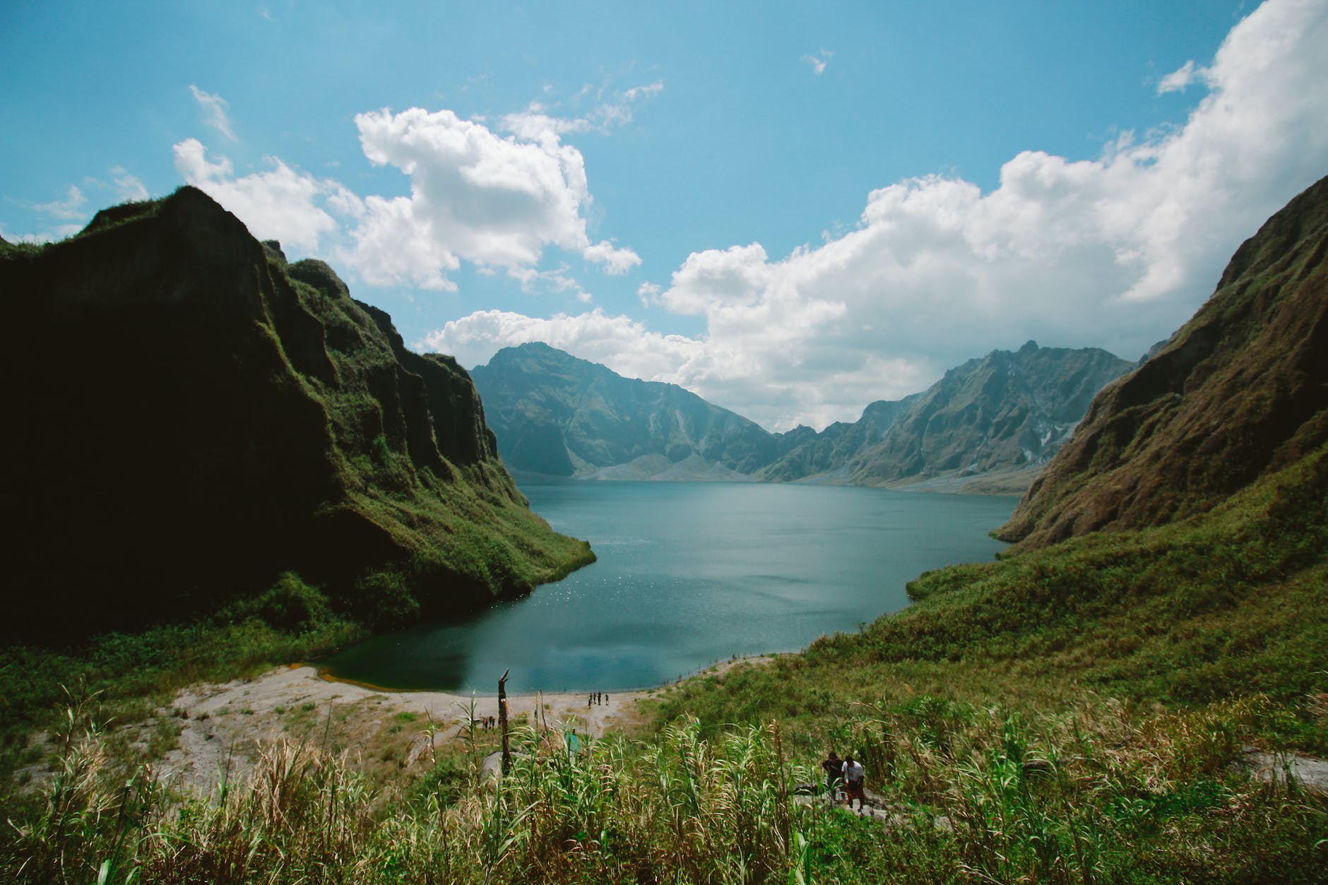 photography of mountains near body of water