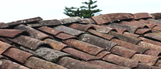 selective focus photo of brown roof shingles