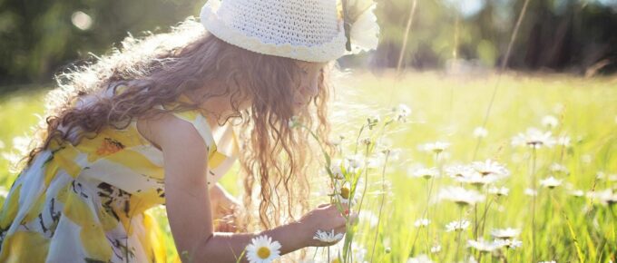 girl picking flowers