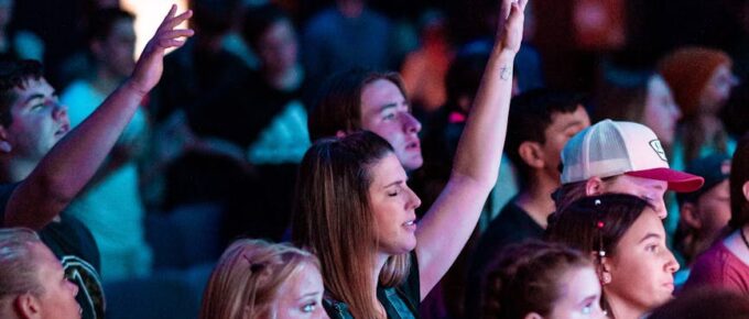 people worshiping at the church