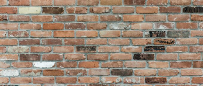 brown brick wall close up photography