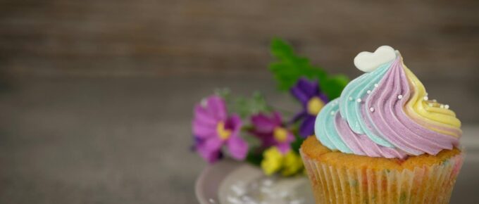 close up photography of cupcake on gray ceramic plate